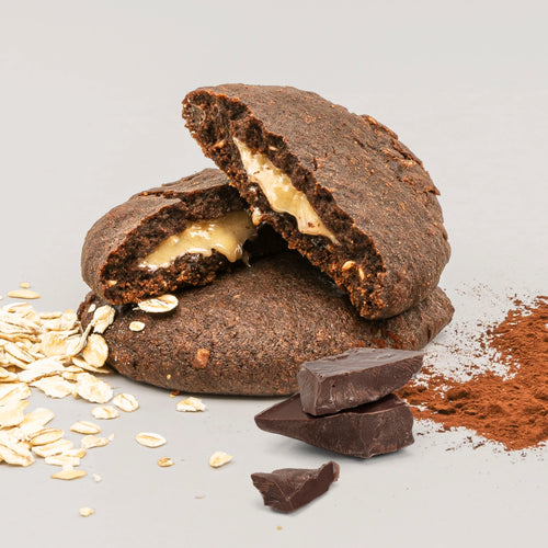 Nupo One Meal Bar Cookies & Cream gebrochener Cookie Riegel Nahaufnahme